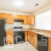 41 Rainford Road Edison, NJ 08820 - Photo 13 of 19 a kitchen with stainless steel appliances granite countertop a stove and a refrigerator
