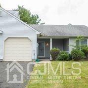41 Rainford Road Edison, NJ 08820 - Photo 15 of 19 a view of a house with pool and plants