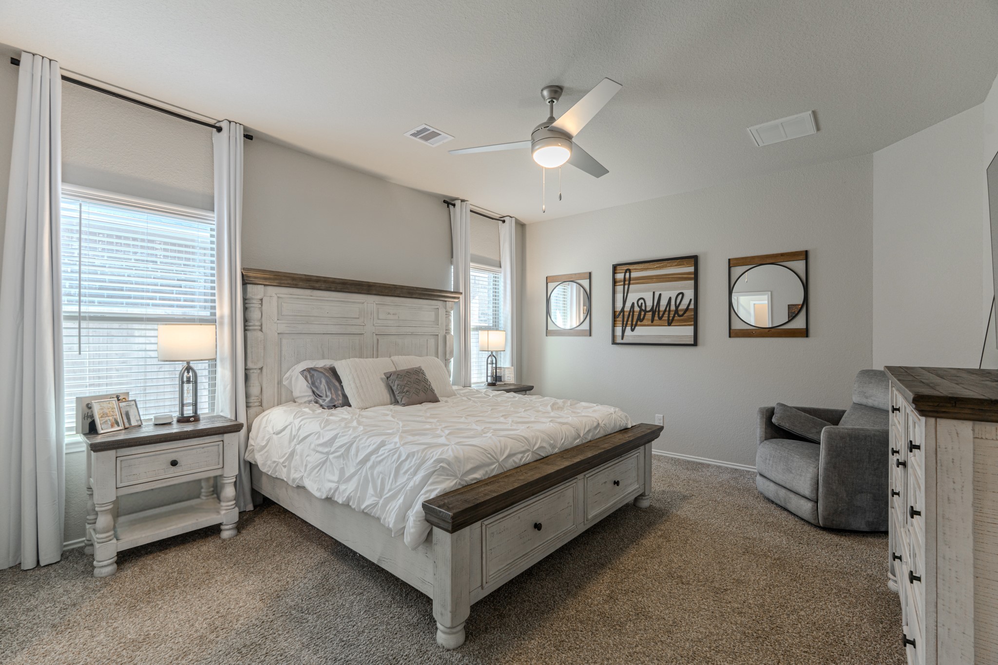 9221 Inland Leather Lane Conroe, TX 77385 - Photo 25 of 47 a bedroom with a bed and a cabinets