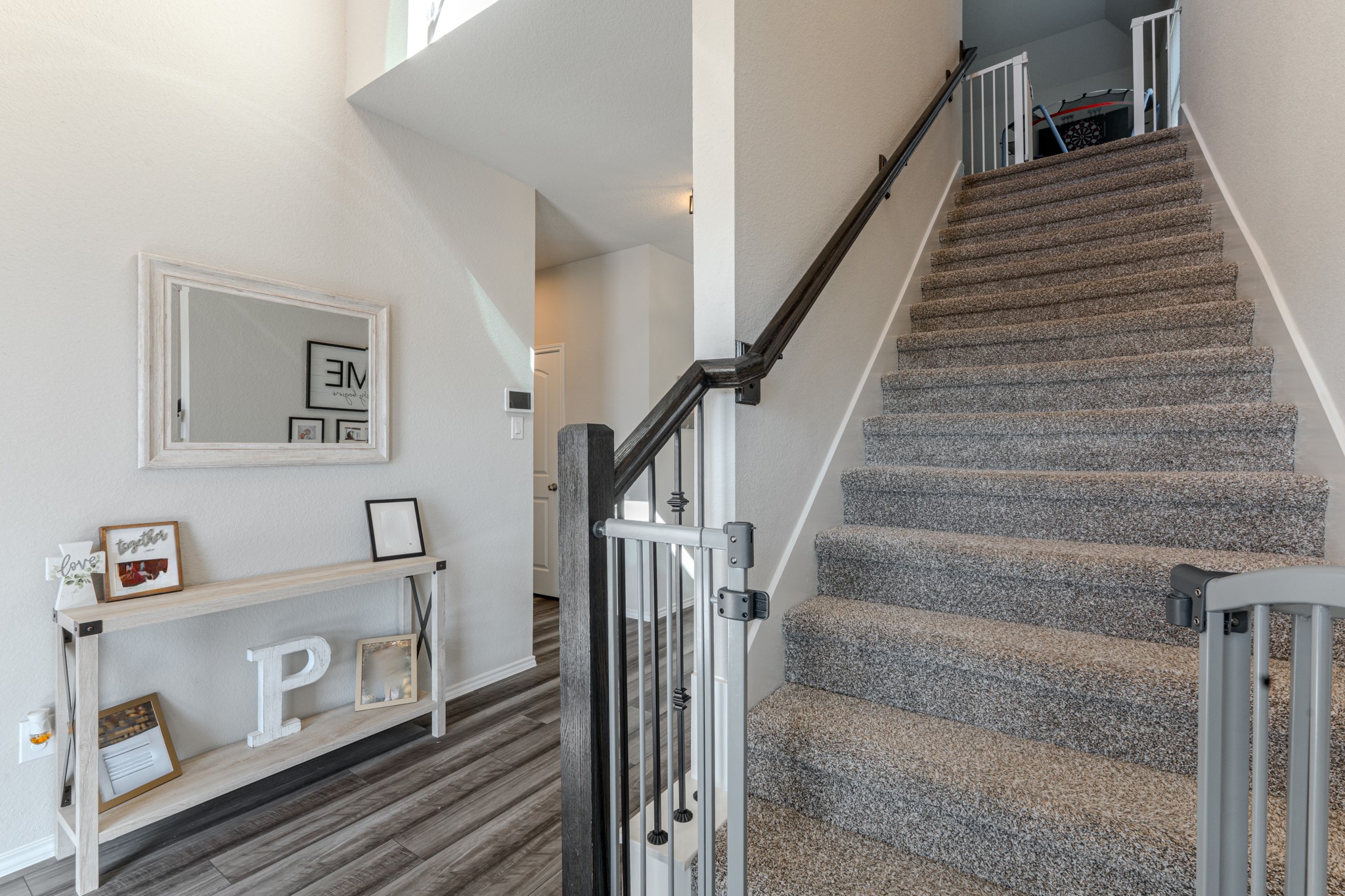 9221 Inland Leather Lane Conroe, TX 77385 - Photo 32 of 47 a view of entryway and hall