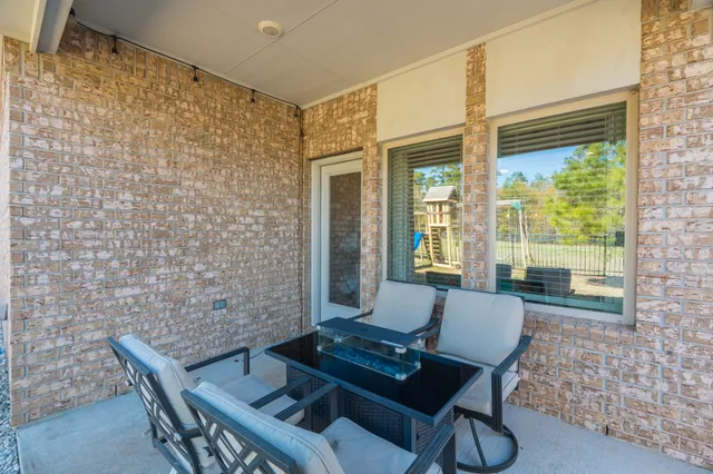 a view of a livingroom with furniture