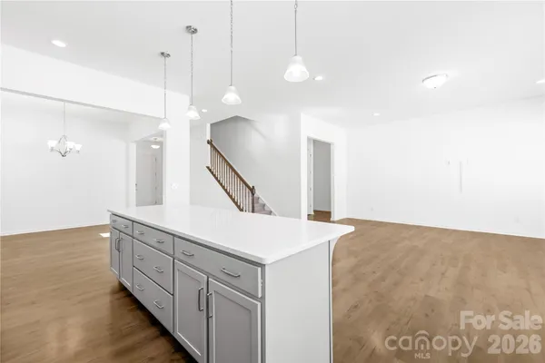a kitchen with a sink and stove