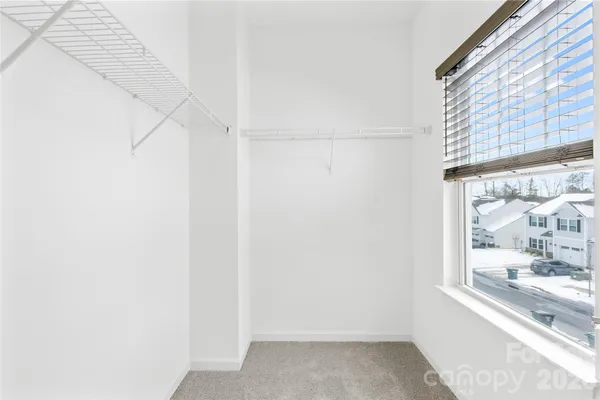 a view of a window in an empty room