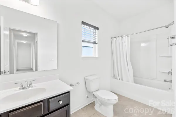 a swimming pool with outdoor seating and yard