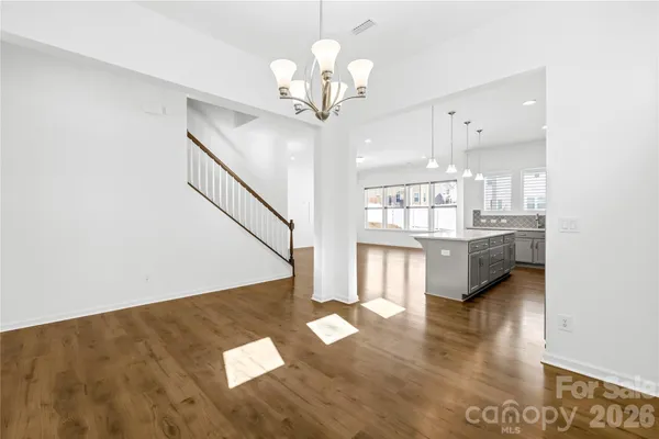 a view of a living room with a large window