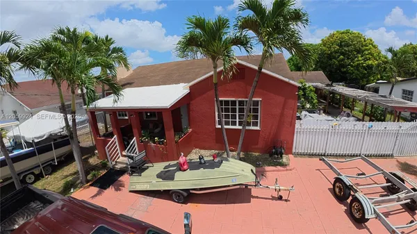 a view of a backyard with a patio