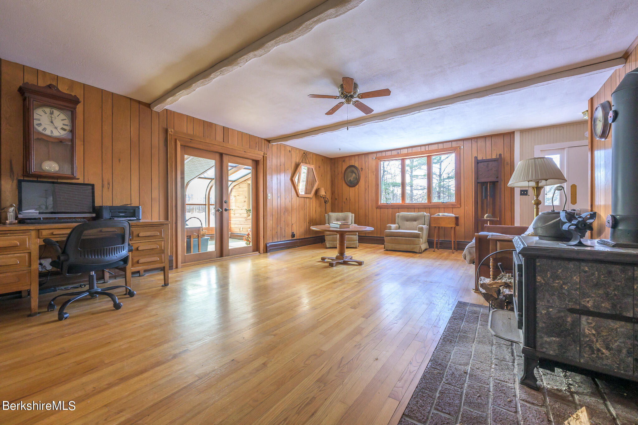 14 Interlaken Road Stockbridge, MA 01266 - Photo 8 of 26 a living room with furniture and a wooden floor