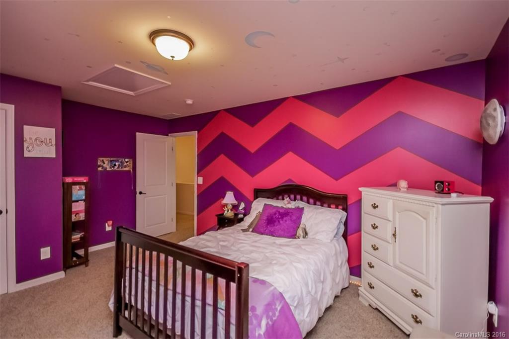 7700 West Berkeley Road Denver, NC 28037 - Photo 15 of 24 a bedroom with a bed and a dresser