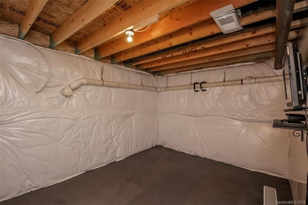 7700 West Berkeley Road Denver, NC 28037 - Photo 19 of 24 a view of a room with racks on the wall