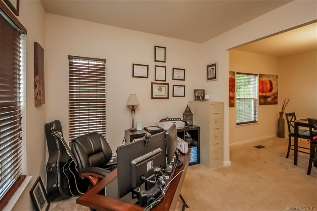 7700 West Berkeley Road Denver, NC 28037 - Photo 8 of 24 a bedroom with furniture and a window