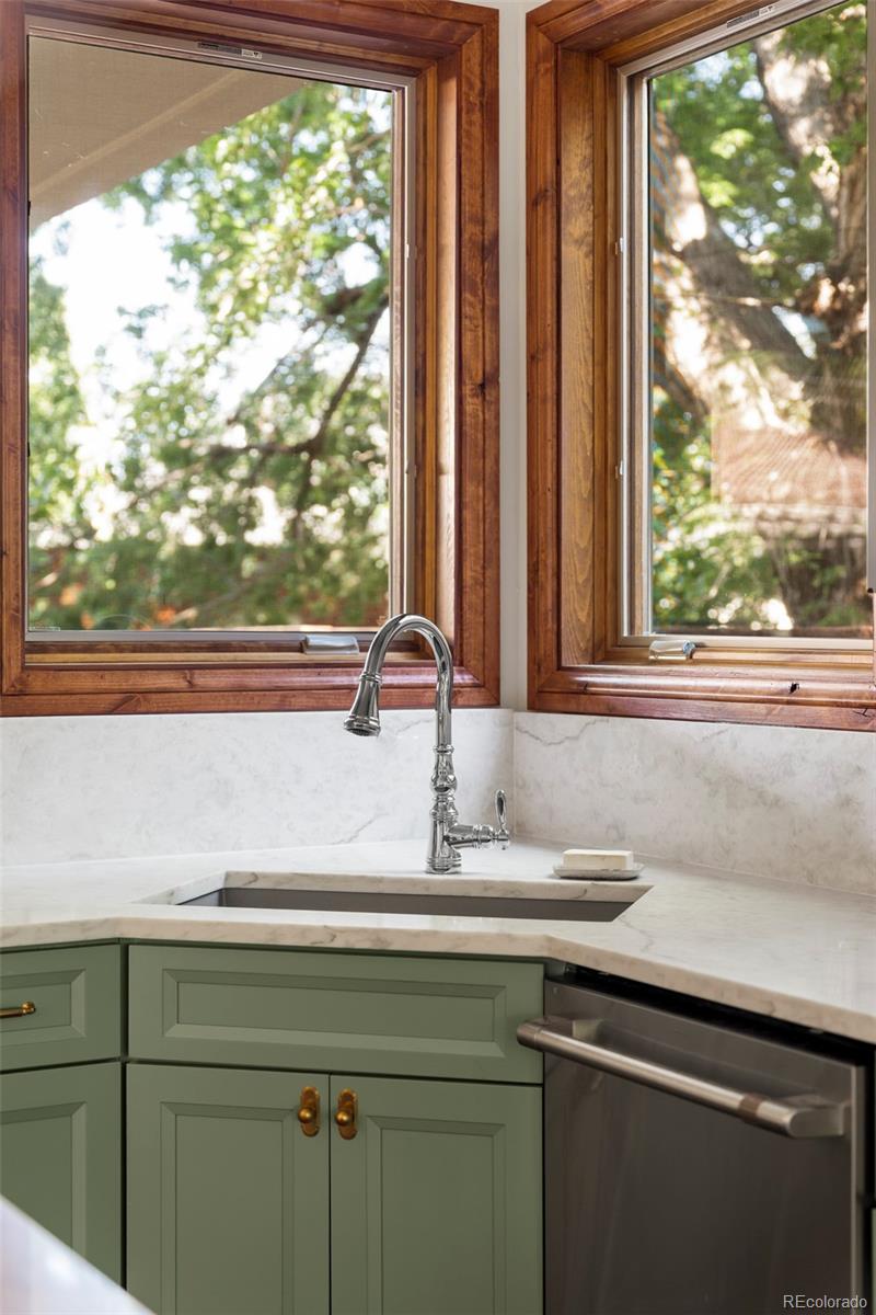 1026 South Cook Street Denver, CO 80209 - Photo 8 of 34 a sink sitting next to a window