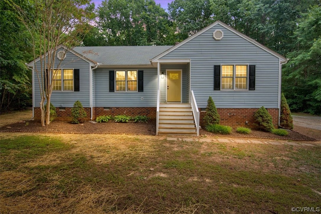 2020 Lone Ridge Drive Powhatan, VA 23139 - Photo 1 of 48 a front view of a house with a yard