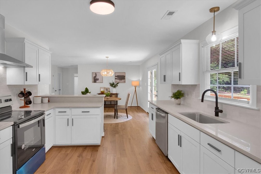 2020 Lone Ridge Drive Powhatan, VA 23139 - Photo 14 of 48 a kitchen with white cabinets and sink