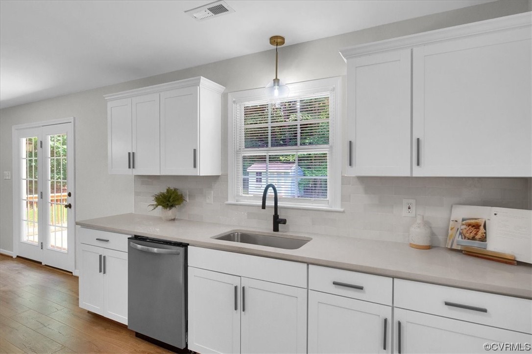 2020 Lone Ridge Drive Powhatan, VA 23139 - Photo 15 of 48 a kitchen with white cabinets and window