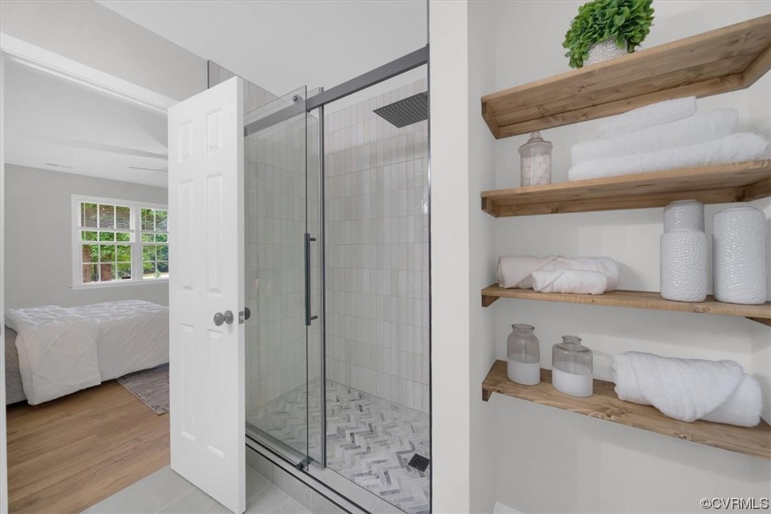 2020 Lone Ridge Drive Powhatan, VA 23139 - Photo 20 of 48 a bathroom with a bathtub and a shower