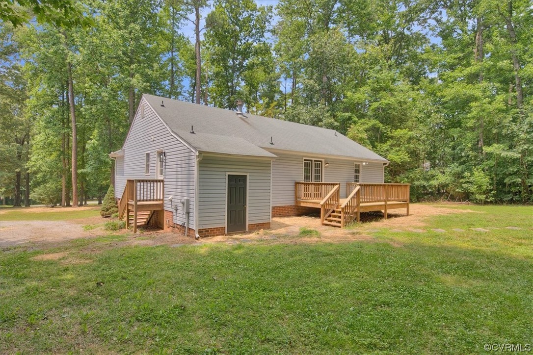 2020 Lone Ridge Drive Powhatan, VA 23139 - Photo 31 of 48 a view of a house with backyard porch and sitting area