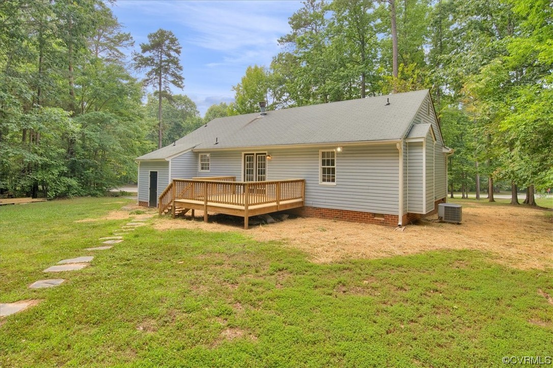 2020 Lone Ridge Drive Powhatan, VA 23139 - Photo 33 of 48 a view of a house with a yard and garage
