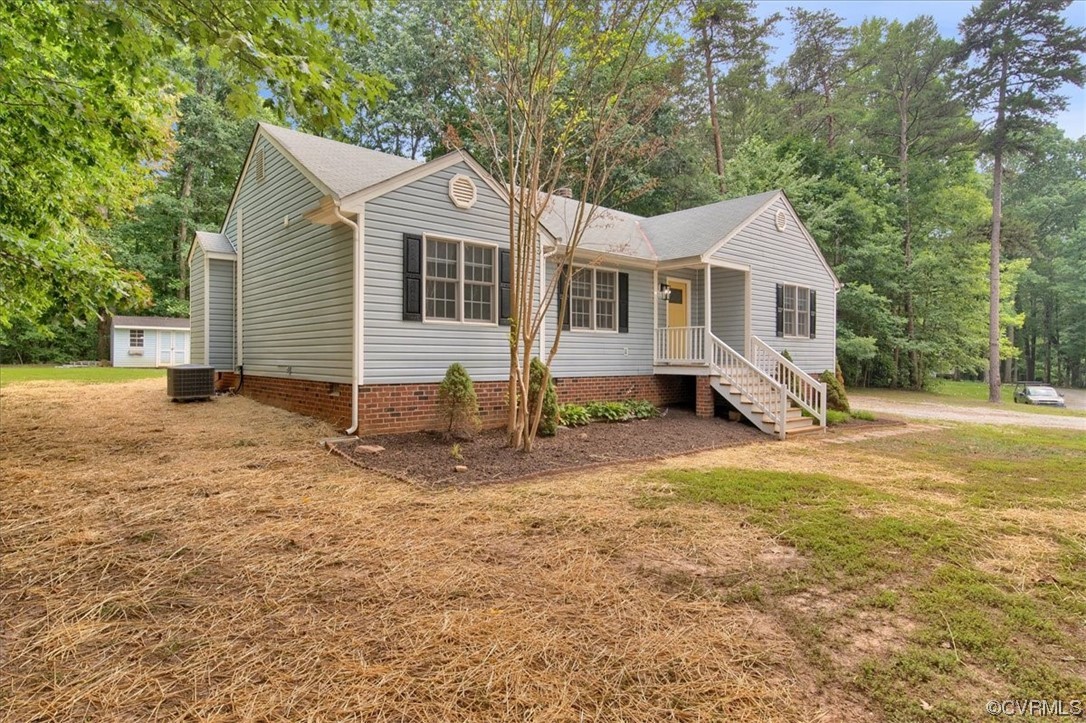 2020 Lone Ridge Drive Powhatan, VA 23139 - Photo 35 of 48 a view of a yard in front of a house with large trees