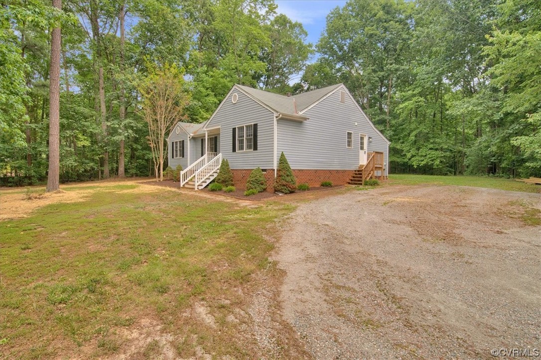 2020 Lone Ridge Drive Powhatan, VA 23139 - Photo 37 of 48 a view of a house with a yard
