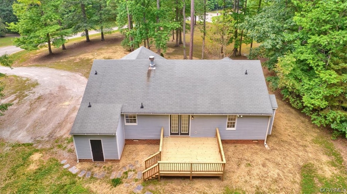 2020 Lone Ridge Drive Powhatan, VA 23139 - Photo 38 of 48 a view of a house with a yard garage and tree