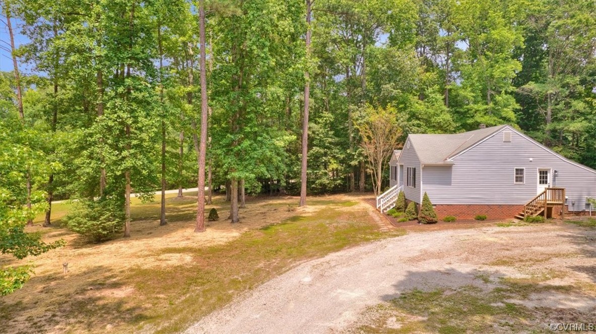 2020 Lone Ridge Drive Powhatan, VA 23139 - Photo 39 of 48 a view of a house with a yard