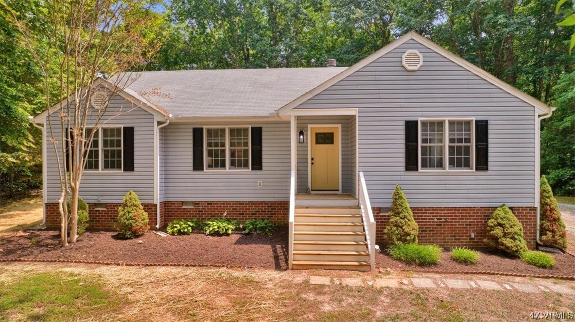 2020 Lone Ridge Drive Powhatan, VA 23139 - Photo 47 of 48 a front view of a house with a yard