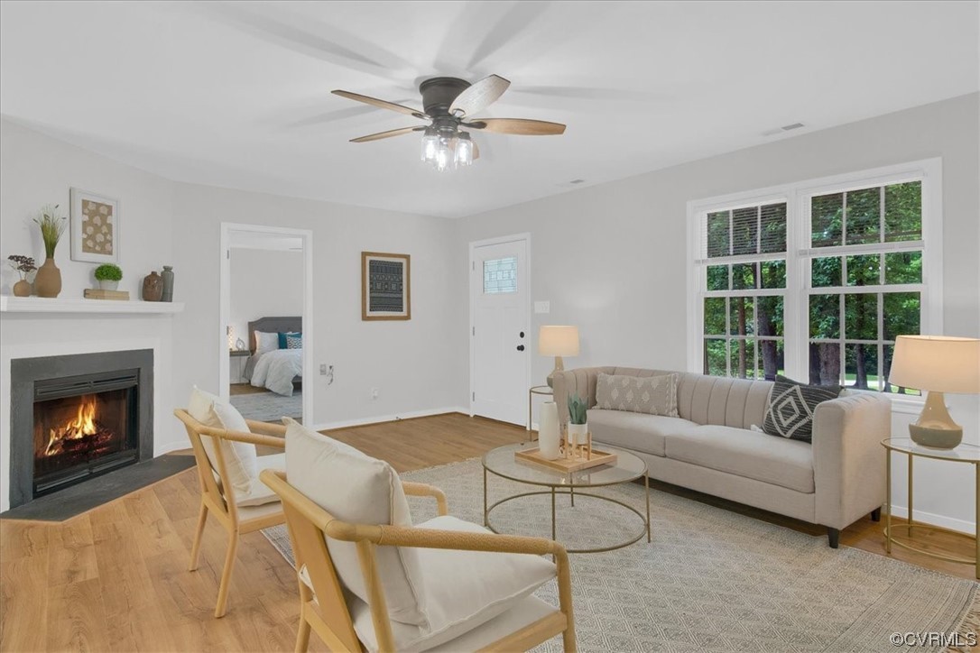 2020 Lone Ridge Drive Powhatan, VA 23139 - Photo 5 of 48 a living room with furniture and a fireplace