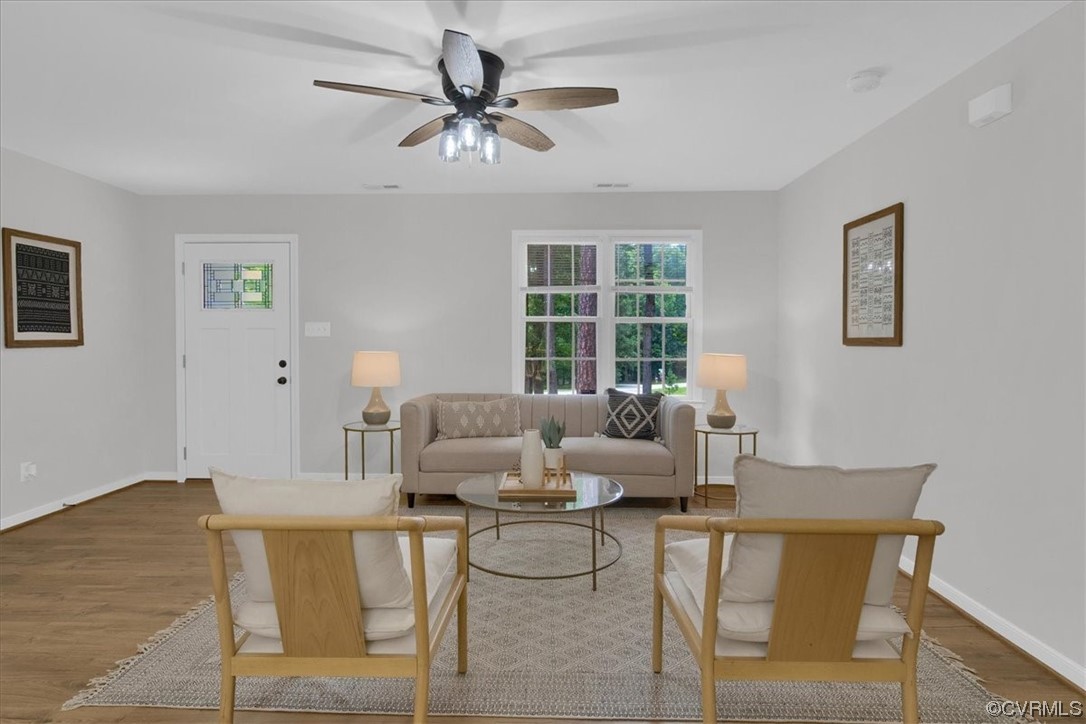 2020 Lone Ridge Drive Powhatan, VA 23139 - Photo 6 of 48 a living room with furniture and a large window