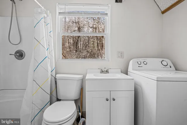 a bathroom with a sink and a toilet