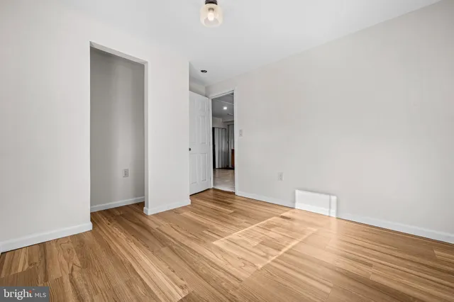 a bathroom with a sink a mirror and shower