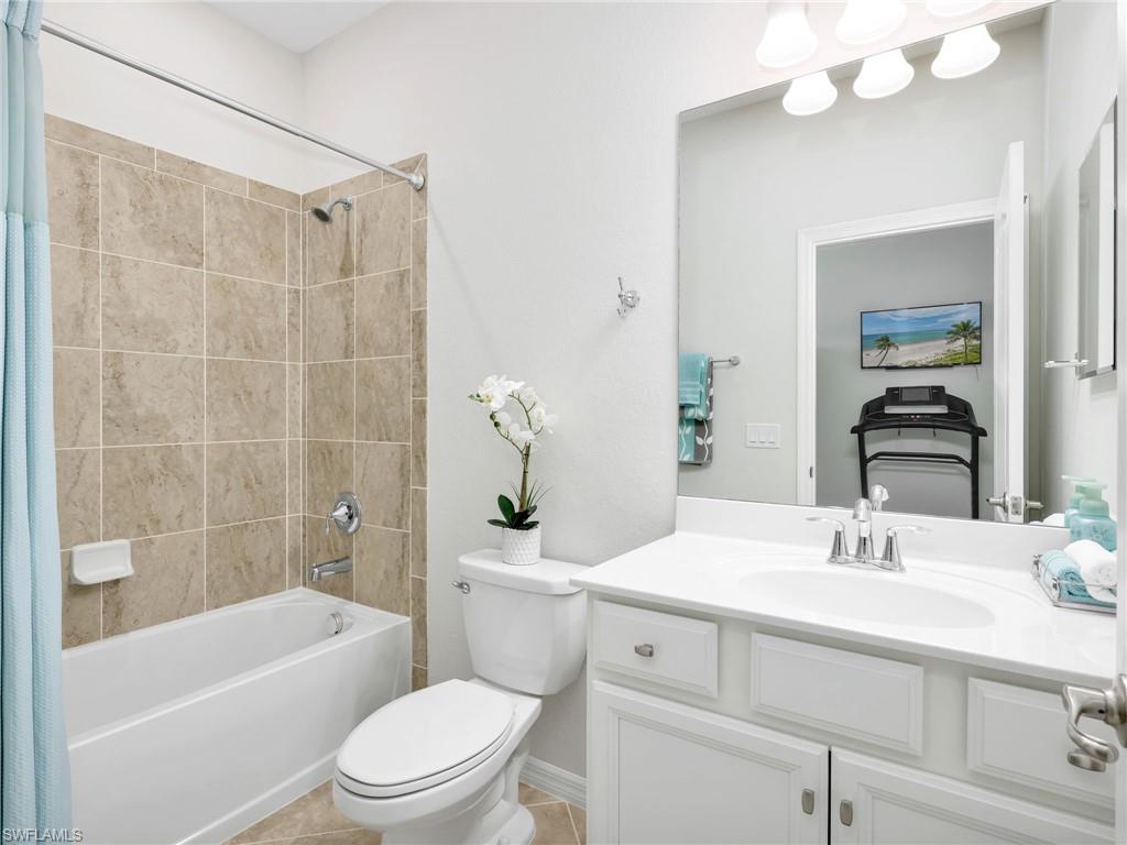 4383 Bismark Way Naples, FL 34119 - Photo 25 of 49 Guest Bedroom 2 With En Suite Bathroom with Tiled Shower/Tub Combo & New Shower Head, & White Shaker Vanity with New Hardware