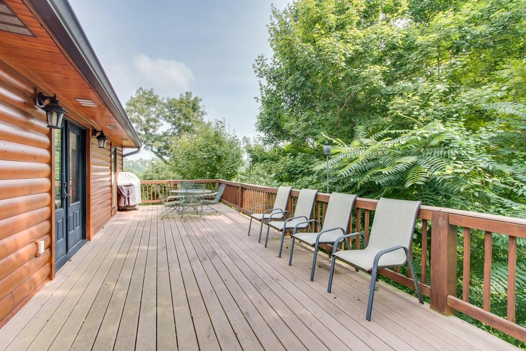 320 Captain Point Silver Point, TN 38582 - Photo 2 of 23 a view of deck with chairs and wooden floor