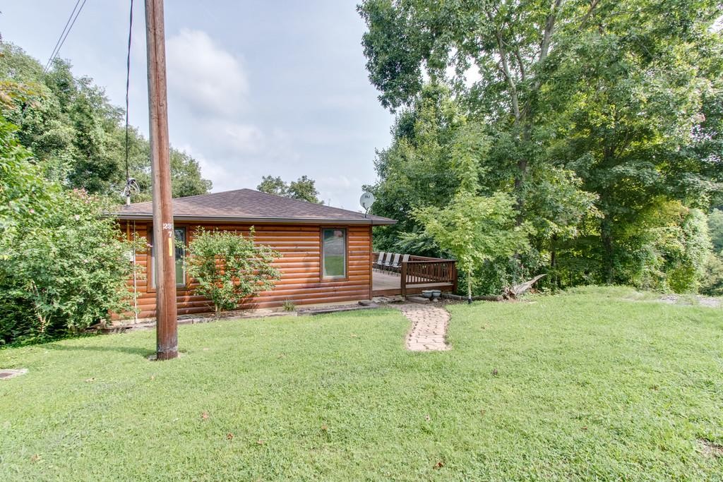 320 Captain Point Silver Point, TN 38582 - Photo 22 of 23 a view of a house with a yard and sitting area