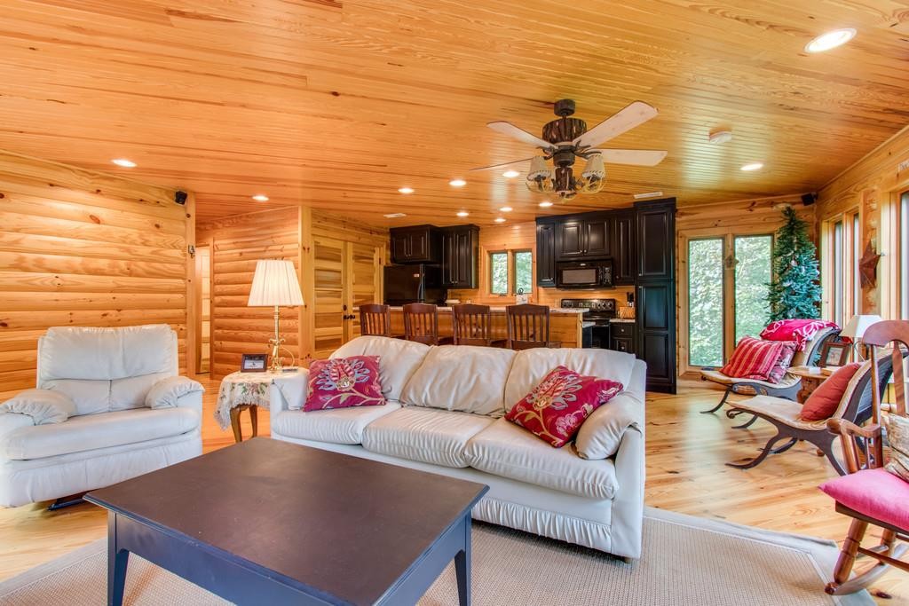 320 Captain Point Silver Point, TN 38582 - Photo 5 of 23 a living room with furniture kitchen view and a large window