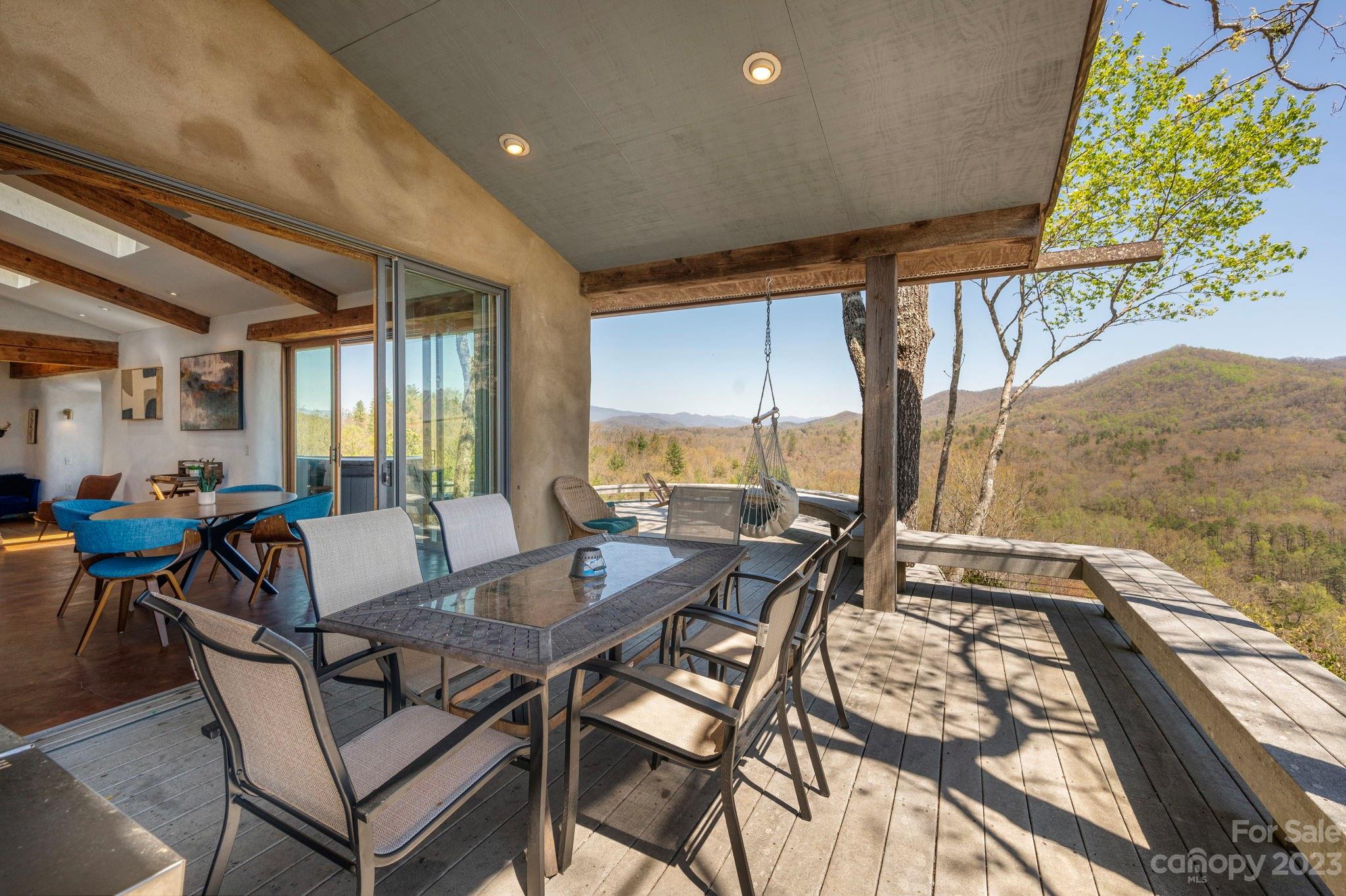 5013 Needmore Road Bryson City, NC 28713 - Photo 13 of 48 a view of a dining room with furniture window and outside view
