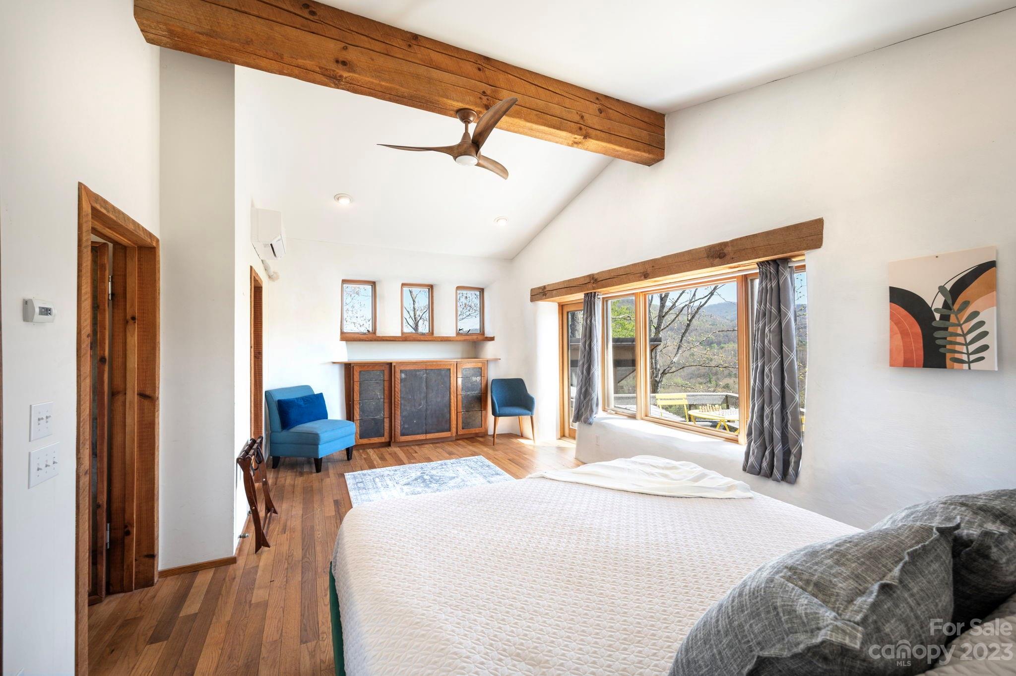 5013 Needmore Road Bryson City, NC 28713 - Photo 20 of 48 a bedroom with a bed and a large window
