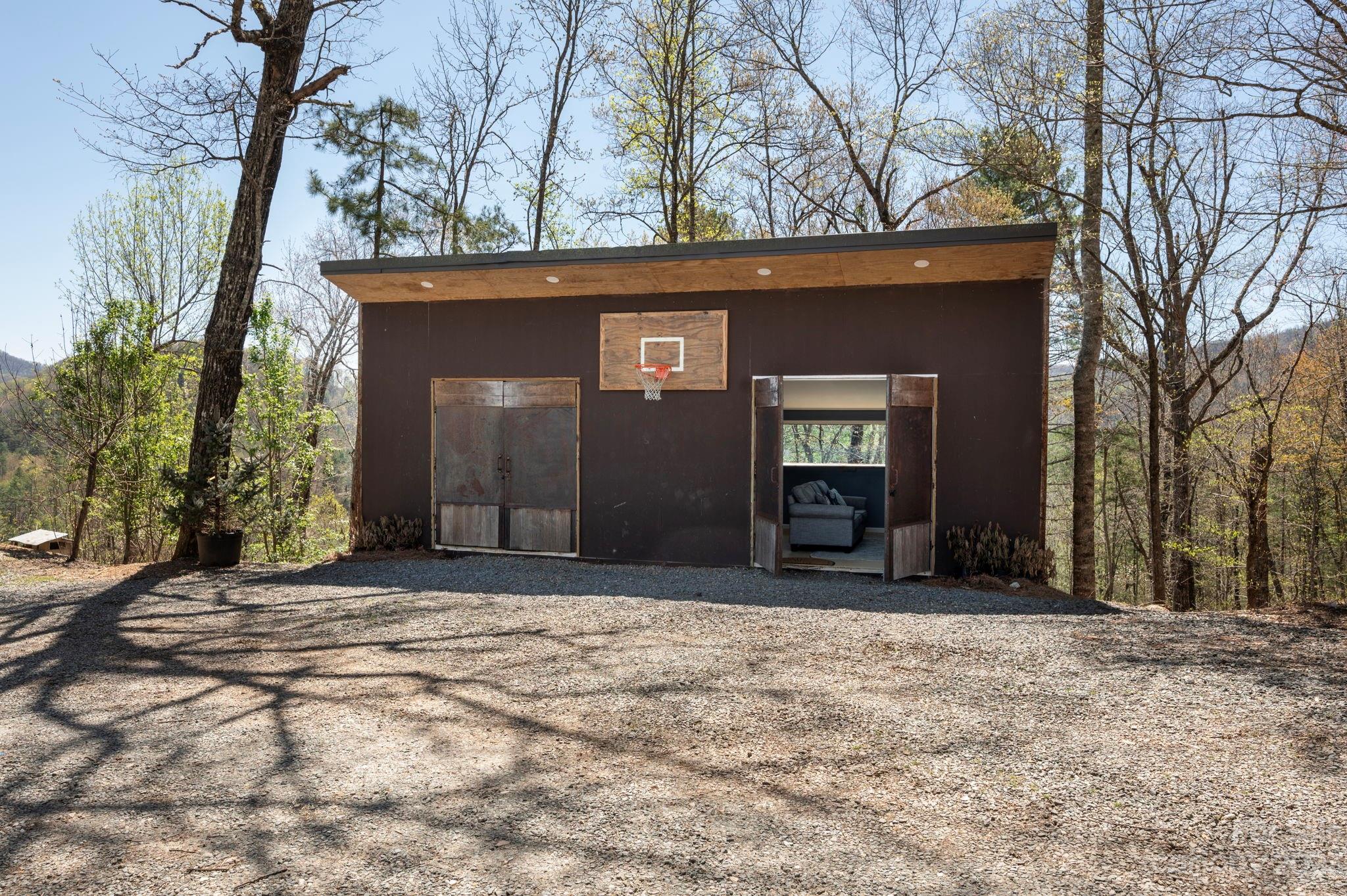 5013 Needmore Road Bryson City, NC 28713 - Photo 38 of 48 a front view of a house with a yard