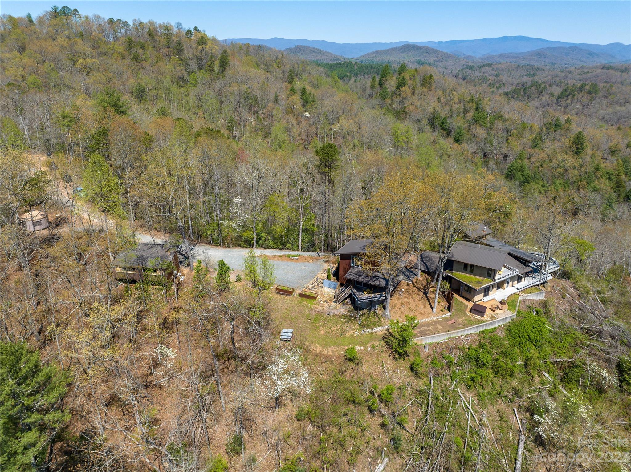 5013 Needmore Road Bryson City, NC 28713 - Photo 4 of 48 a view of a lake with mountains in the background