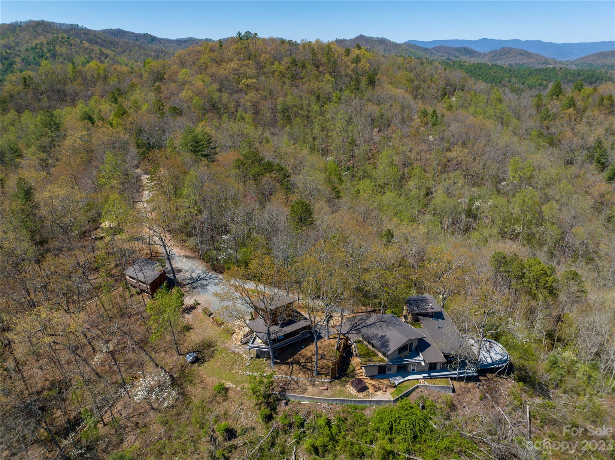 5013 Needmore Road Bryson City, NC 28713 - Photo 5 of 48 an aerial view of a house with a yard