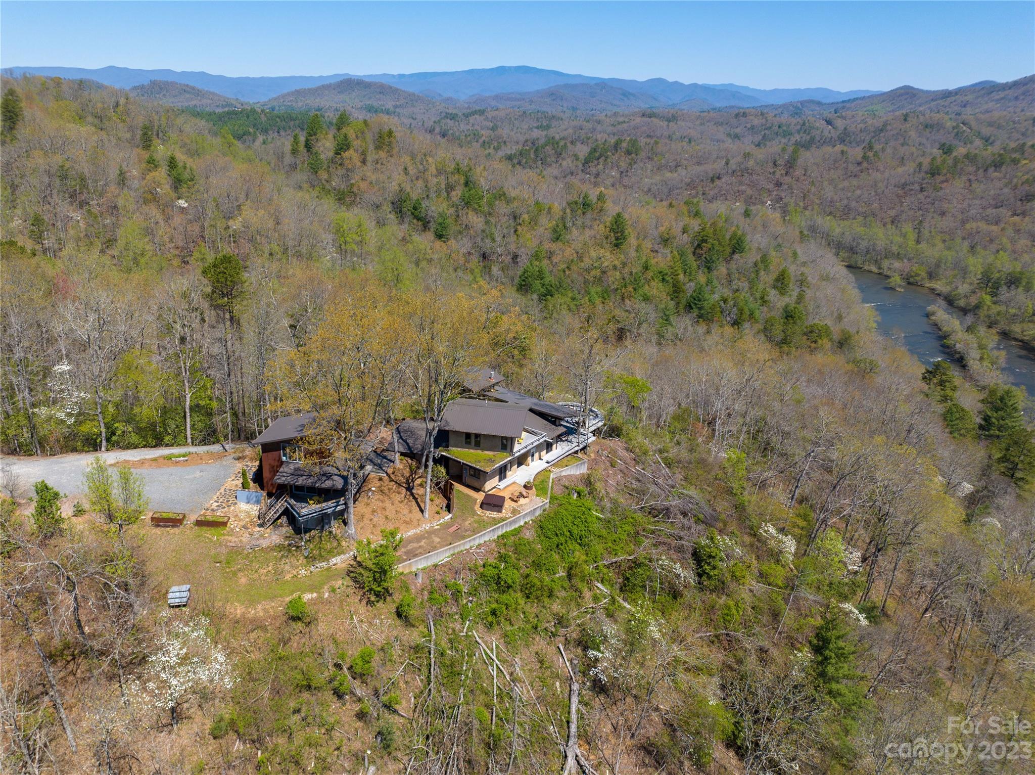 5013 Needmore Road Bryson City, NC 28713 - Photo 6 of 48 a view of a lake with mountains in the background