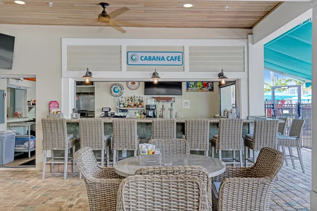 a bedroom with furniture and flat screen tv