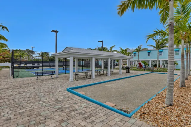 a view of a garden with a palm tree