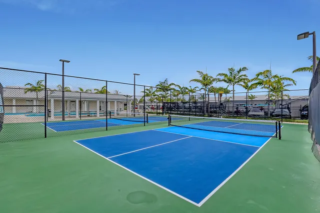 an aerial view of a house with outdoor space