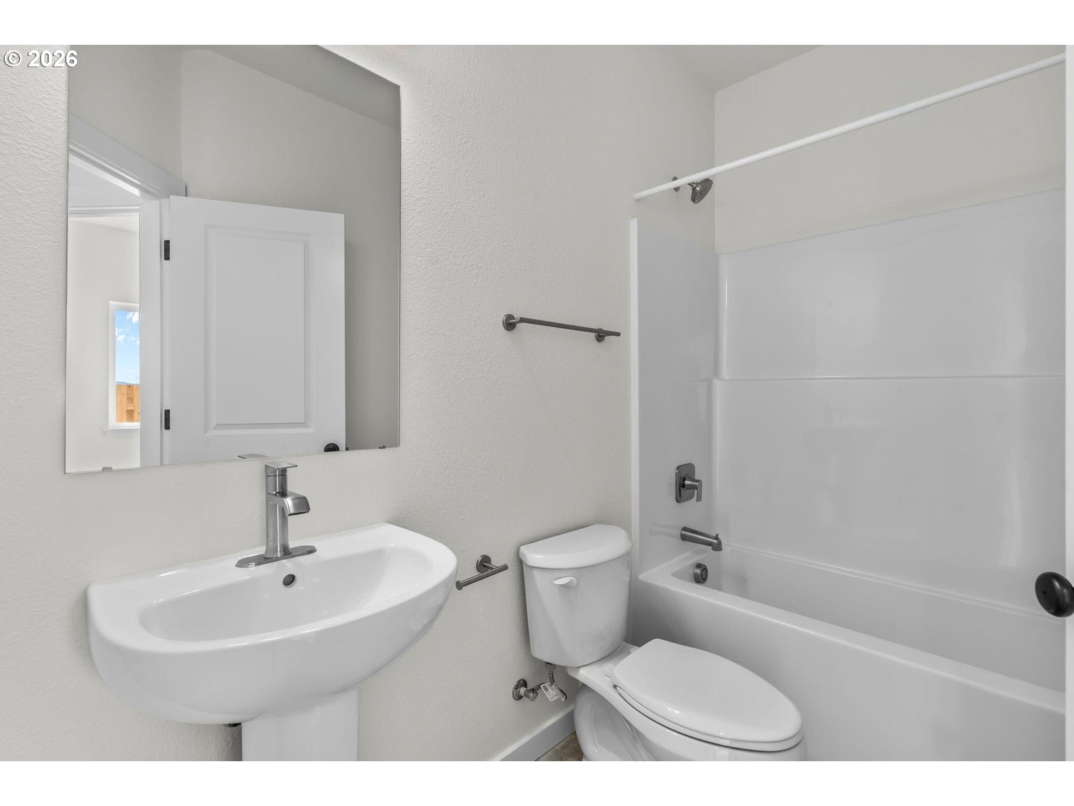 510 Southwest 6th Street Madras, OR 97741 - Photo 16 of 22 a bathroom with a sink toilet and shower