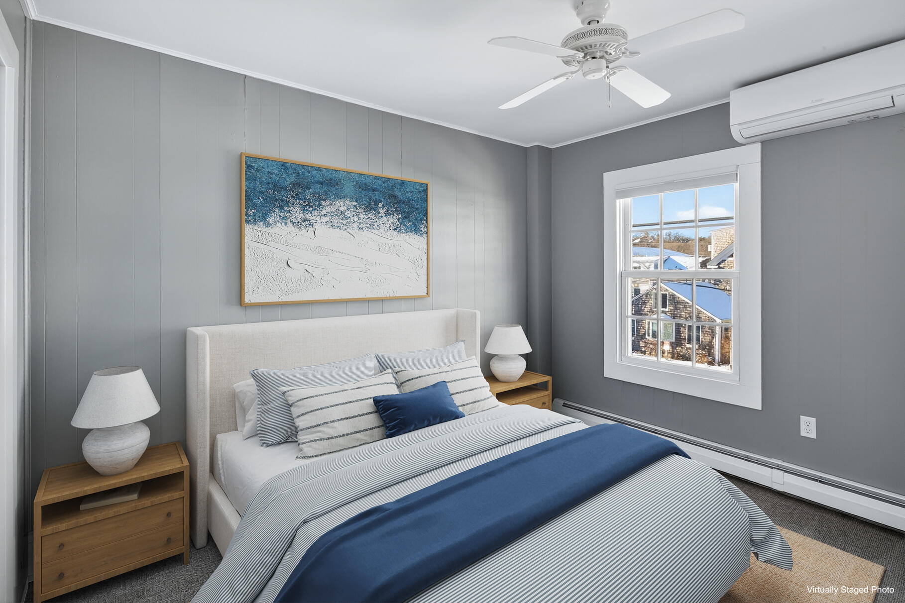 539 Commercial Street, Unit 3 Provincetown, MA 02657 - Photo 13 of 29 a bedroom with a bed and a painting on the wall