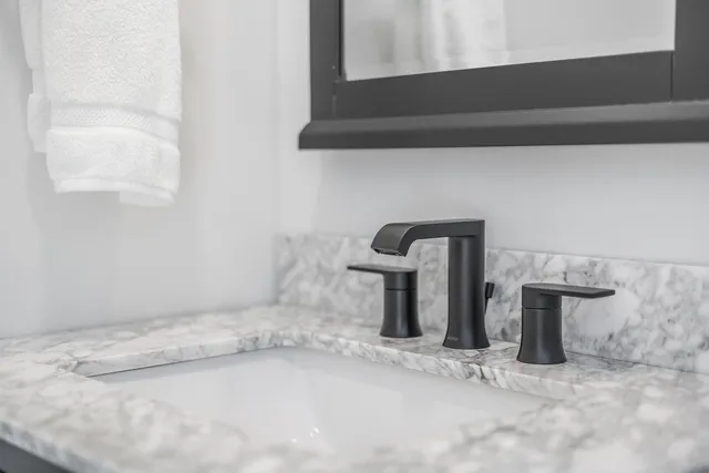 a close view of a sink in the kitchen