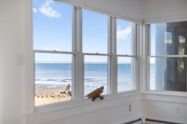 a view of a room that has a window in it