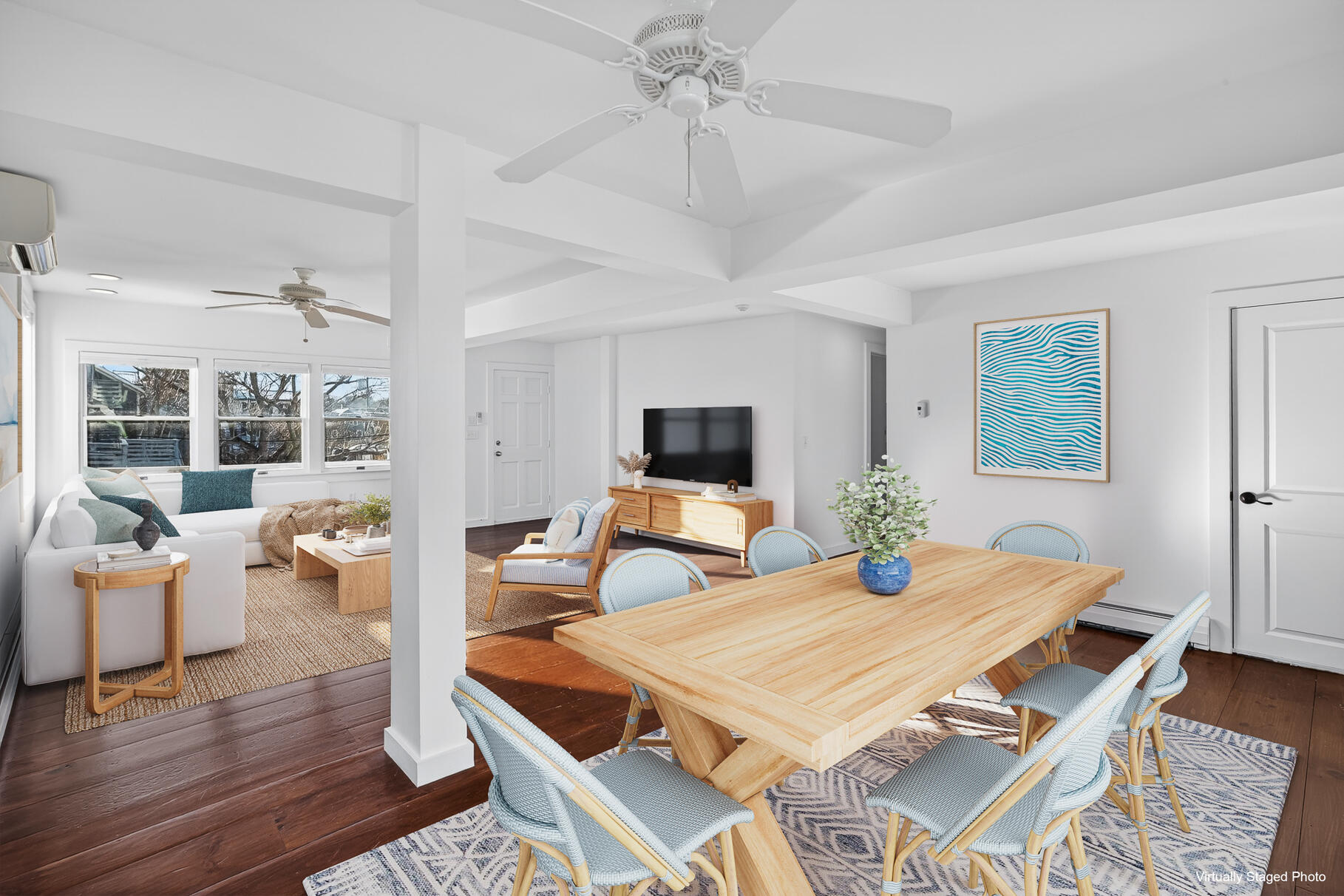 539 Commercial Street, Unit 3 Provincetown, MA 02657 - Photo 5 of 29 a bedroom with a bed and wooden floor