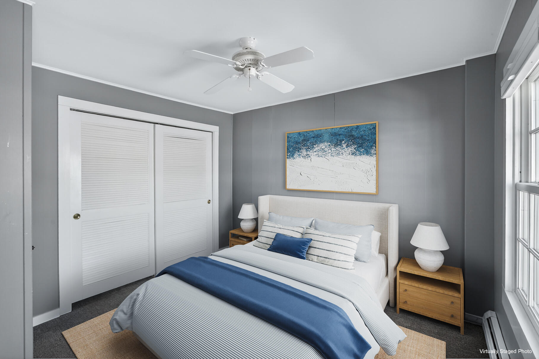 539 Commercial Street, Unit 3 Provincetown, MA 02657 - Photo 7 of 29 a bedroom with a bed and a chandelier