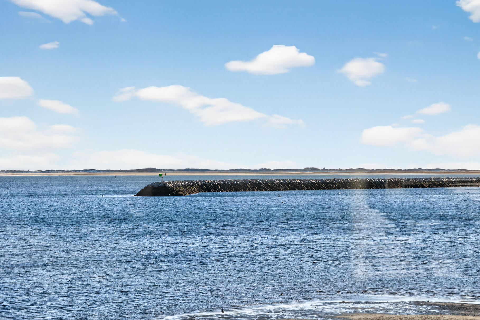 539 Commercial Street, Unit 3 Provincetown, MA 02657 - Photo 8 of 29 a view of a lake and mountain in the back